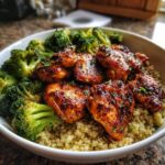 A bowl of perfect comfy, high protein meal with glazed chicken, broccoli, and quinoa.