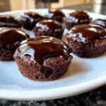 A plate of decadent Brownie Bites with Ganache, showcasing the rich chocolate topping.